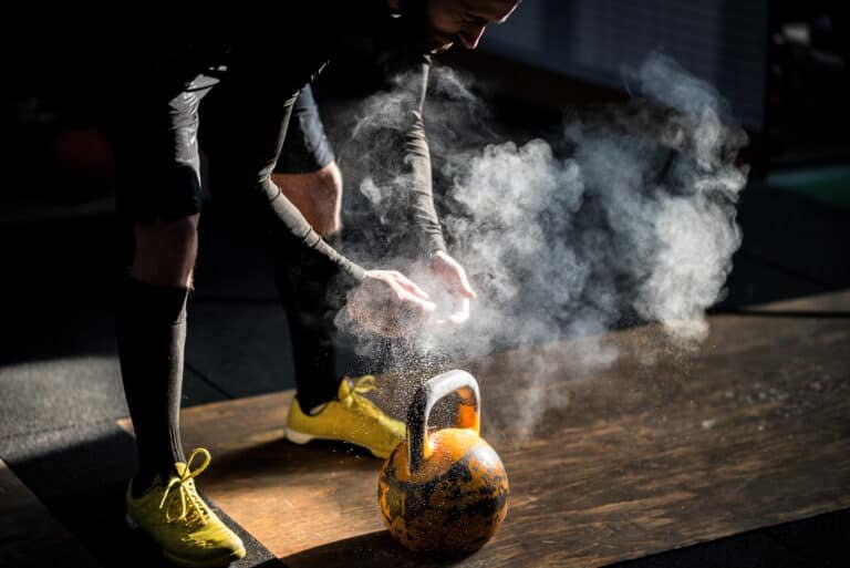 Man holding kettlebell - Cross training gym