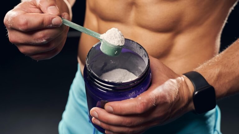 Man Scooping Protein from Container