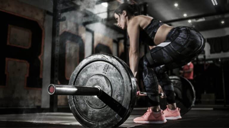 Woman performing a deadlift exercise